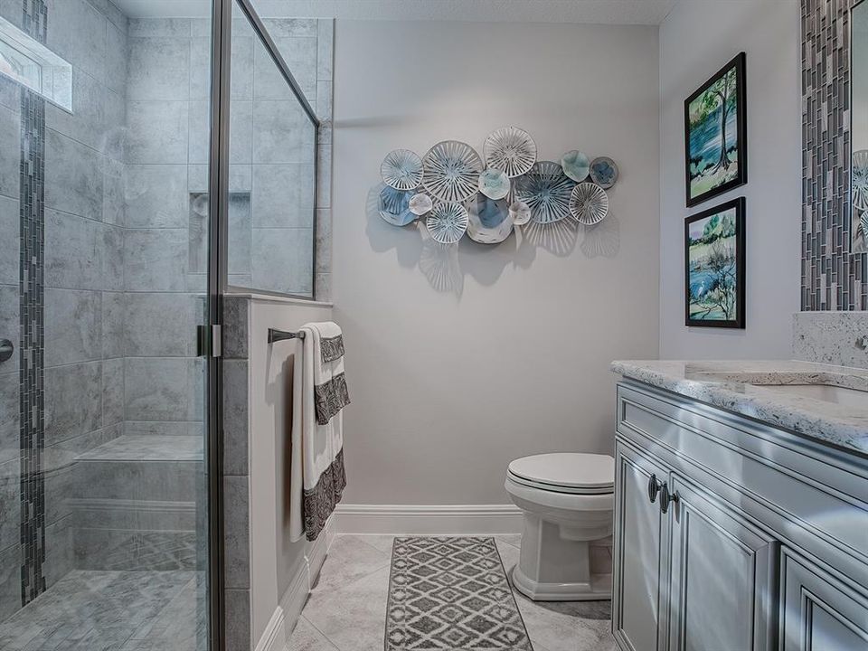 LOVELY TILED SHOWER.