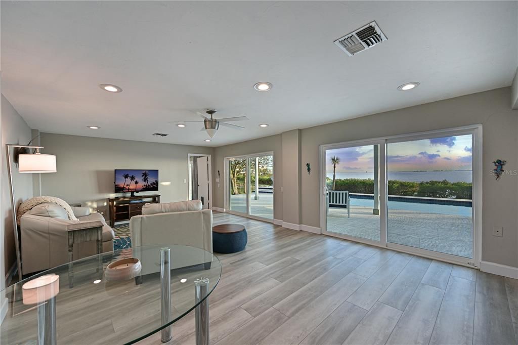 Downstairs Living area with pool and bay view. Perfect for guest suite, in-law suite or teen suite.