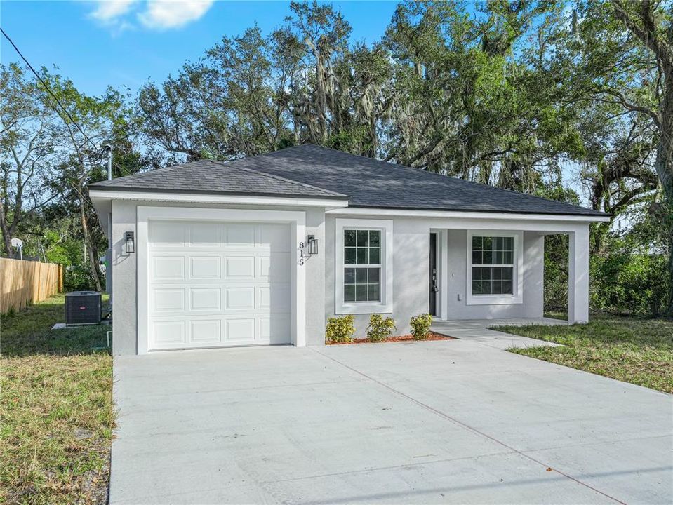 Double driveway, with one car garage.