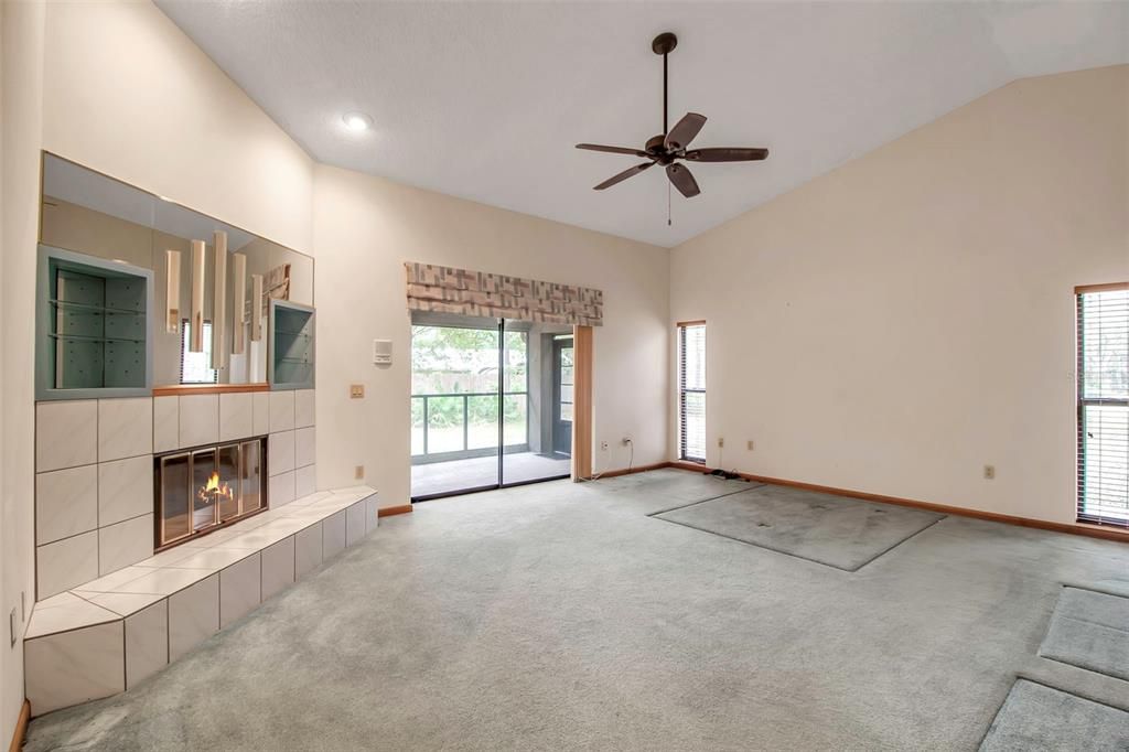 Master bedroom with wood burning fireplace