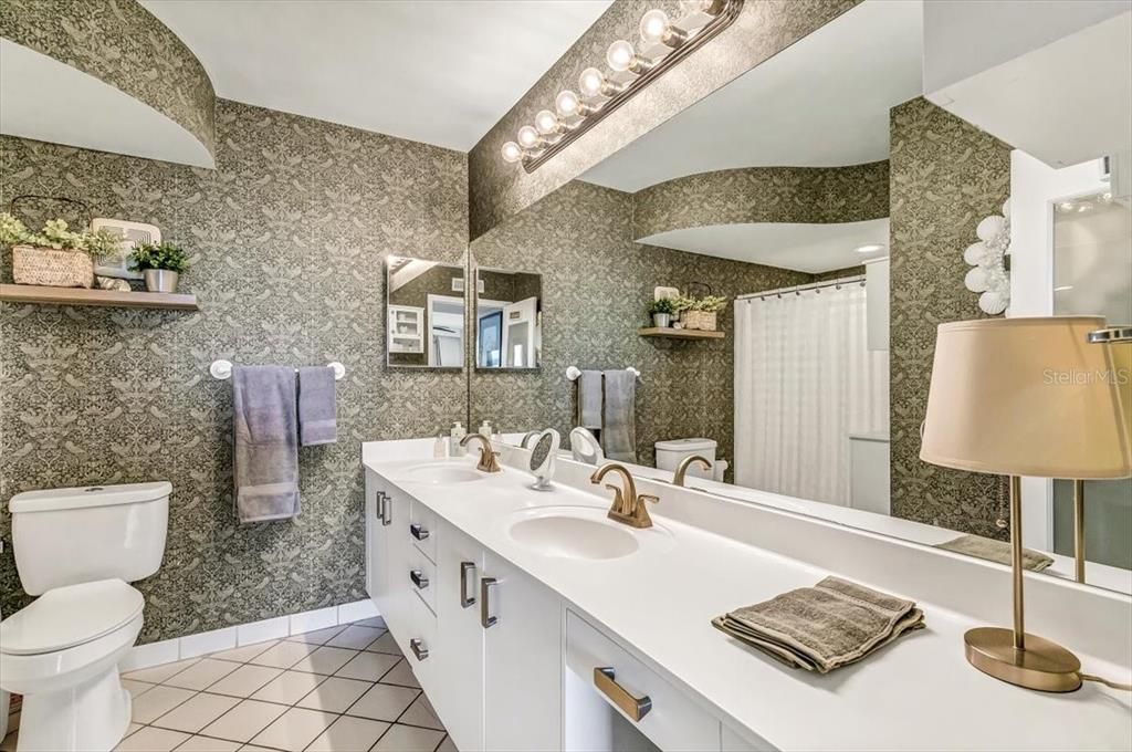 Master bath with double sink vanity.