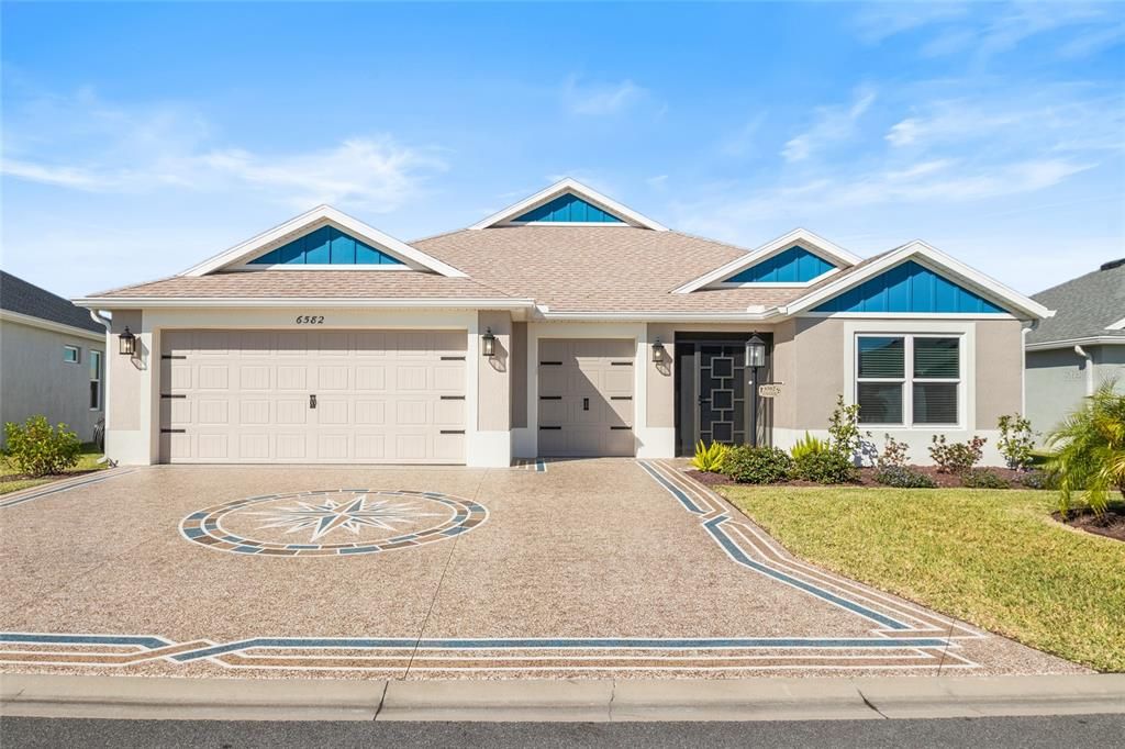 Front View with painted driveway.