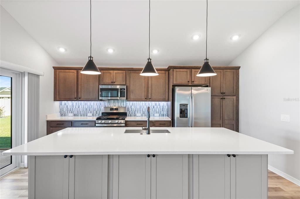 Kitchen - Cabinets under the island.