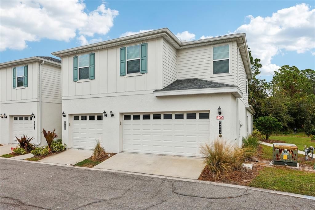 Outside Front - Unit is the 2 car garage end unit.