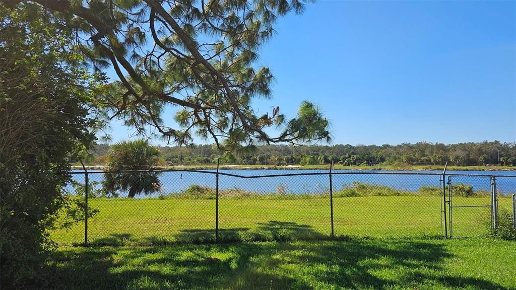 Property ends at fence.  No access to waterfront.