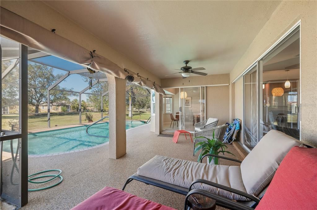 Comfortable lanai overlooking pool and expansive lawn