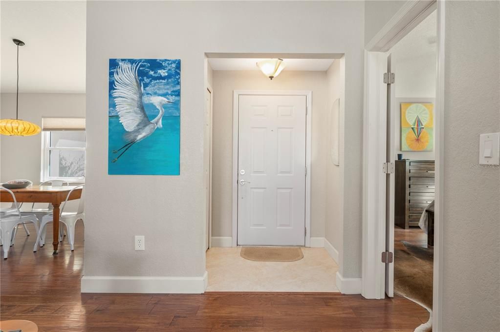 Small foyer inside with coat closet