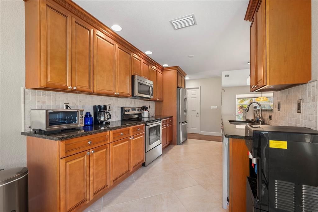 Kitchen toward Laundry Room with extra storage