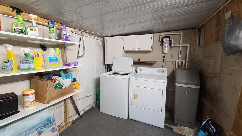 Laundry Room and storage attached to screened porch.