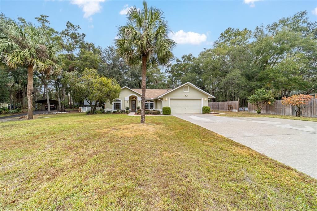 FRONT SHOWING LONG DRIVEWAY