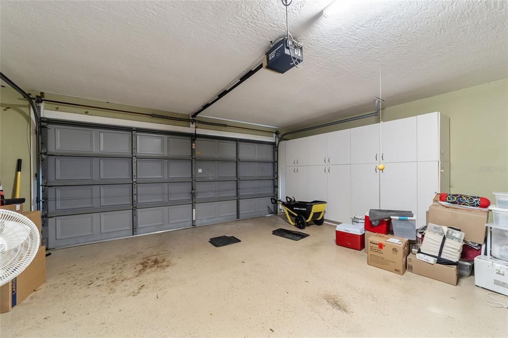 GARAGE SHOWING STORAGE CABINETS