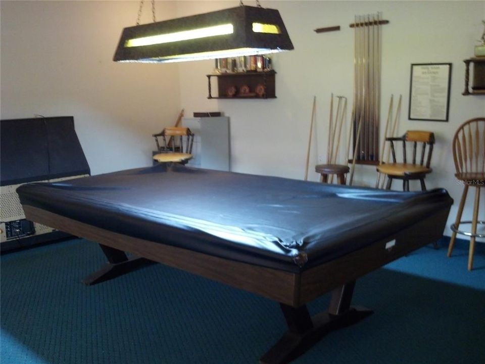 Pool table also available in game room.