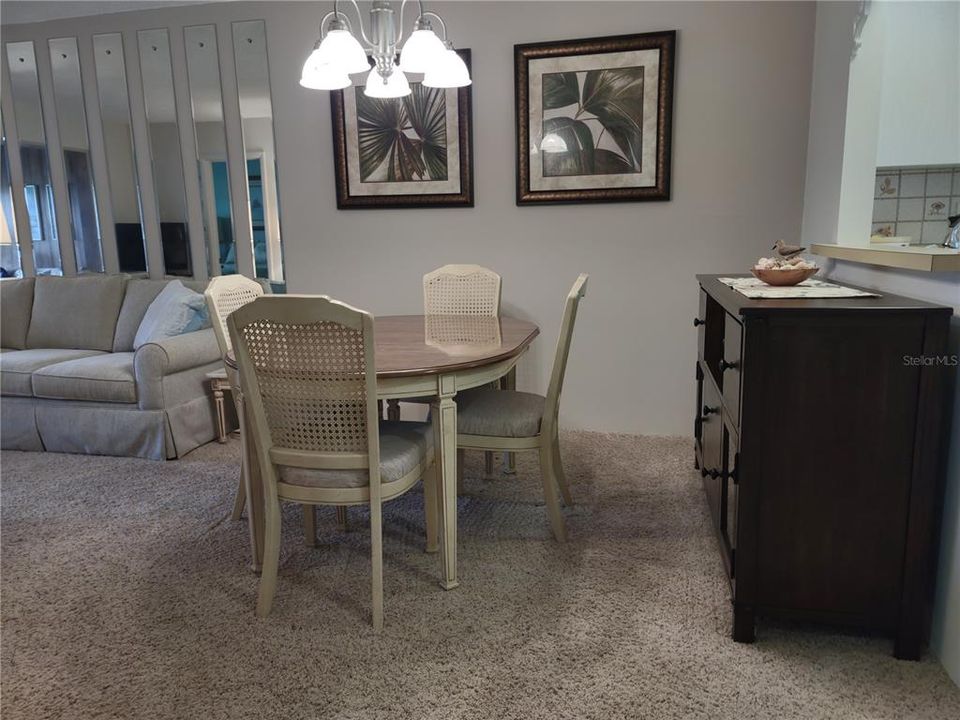 Dining area flows into living room.