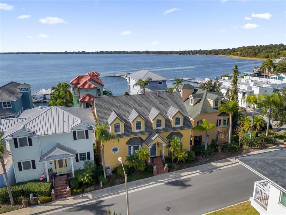 Front view of house with Lake Dora in view