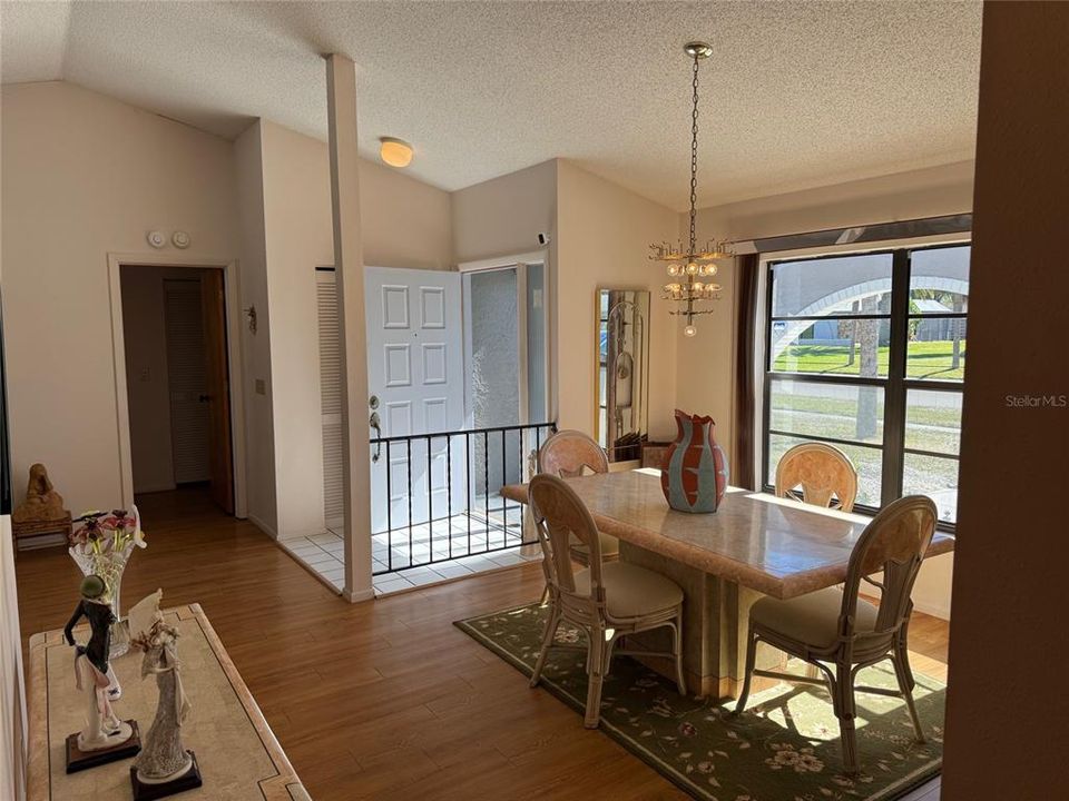 Dining Room with a Vaulted Ceiling