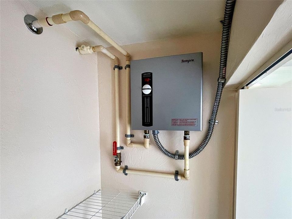 Tankless, On-Demand Water Heater in Laundry Closet