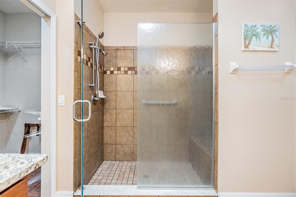 LARGE shower with a seat in the Owners retreat