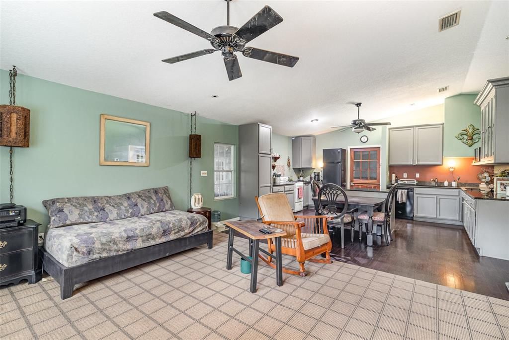 In-Law Suite: Family Room into Kitchen and Entry Door