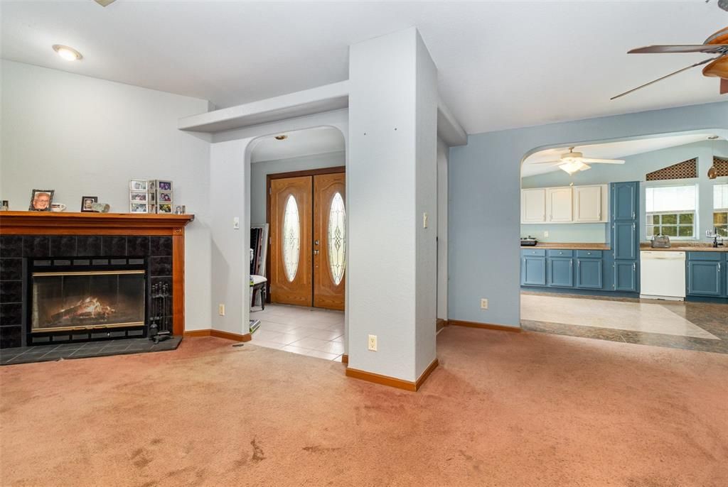 Main House: Living Room into Kitchen and Front Door