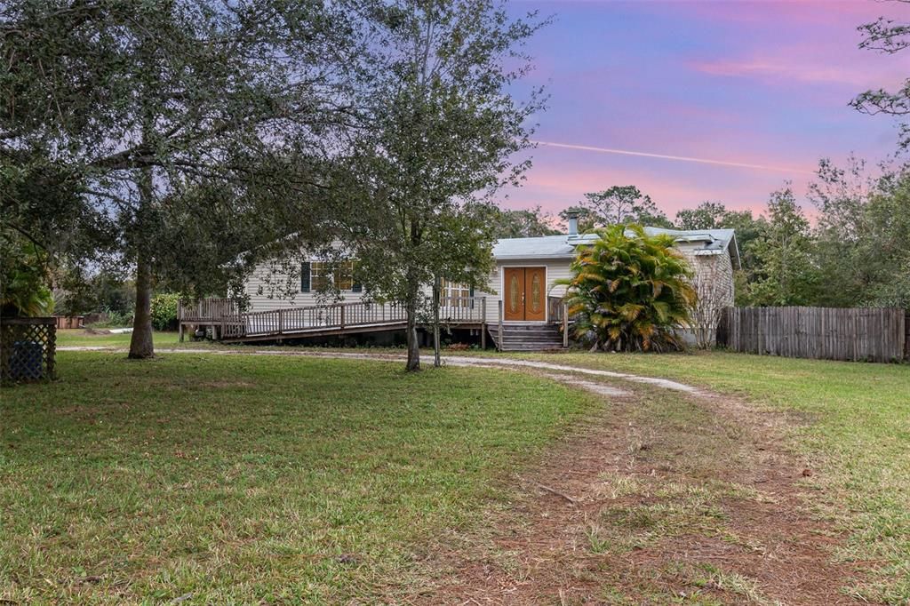 Front of Main House and View of Circular Driveway