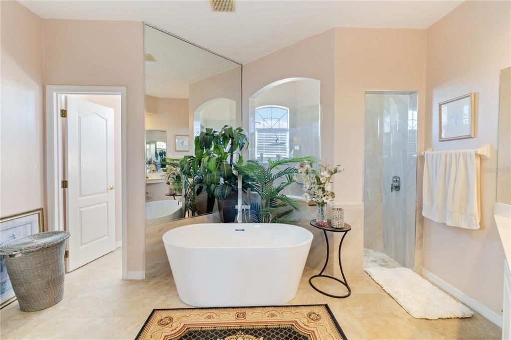 updated bathroom with elegant freestanding tub