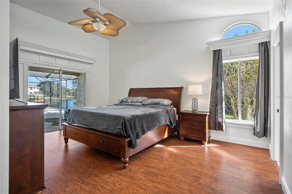 Primary Bedroom with wood laminate flooring