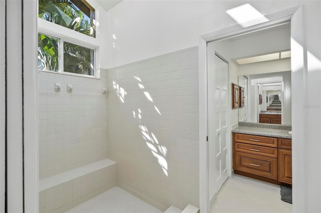 Large garden style ensuite shower with generous natural lighting but still a ton of privacy!