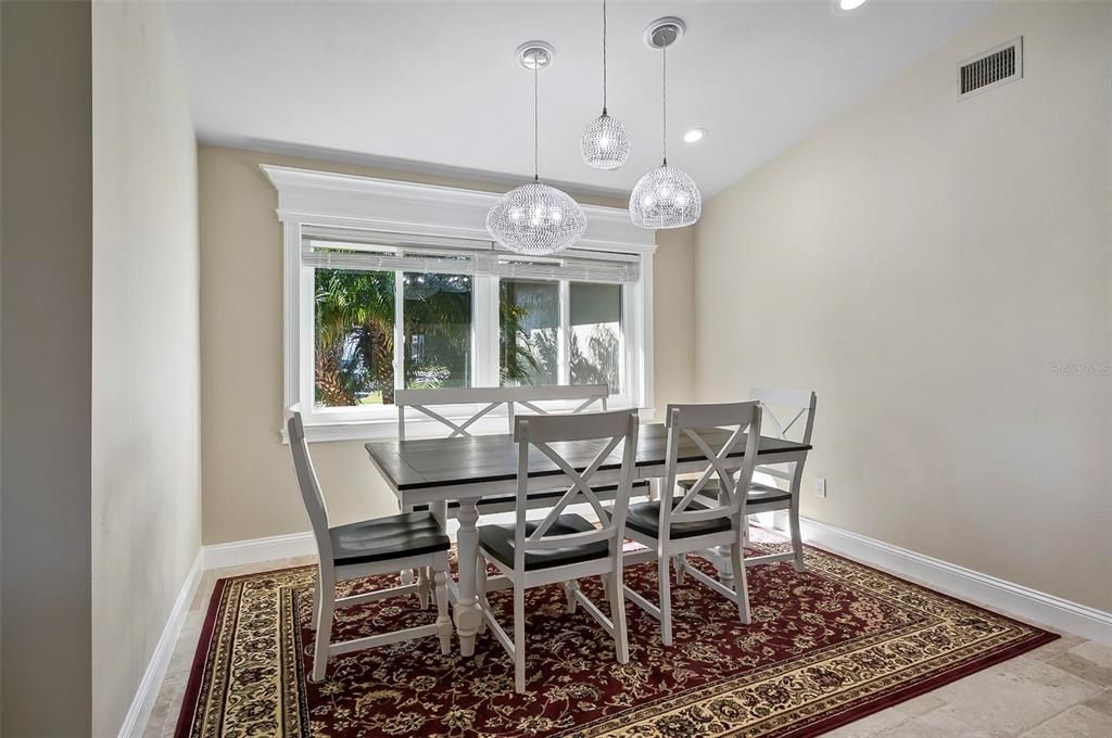 Well lit with natural lighting formal dining room