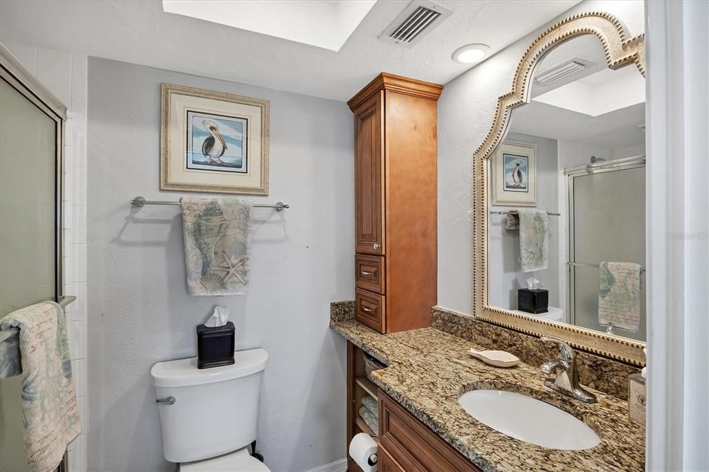 Master Bath upgrades include wood cabinets & granite vanity top