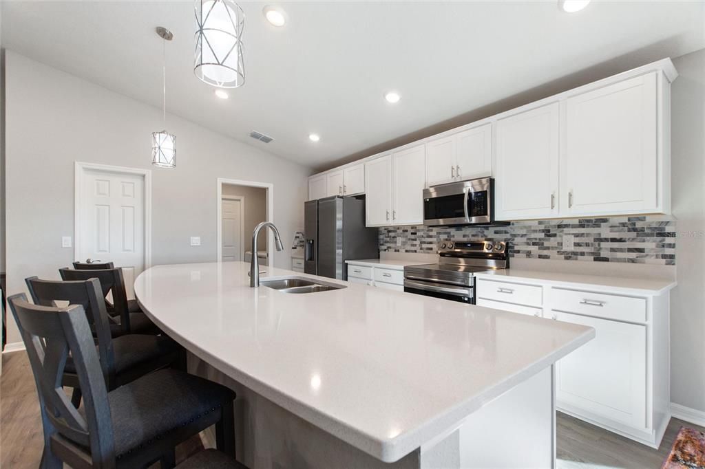 Pendant lights over breakfast bar