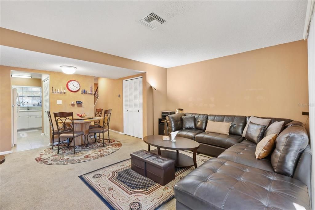 LIVING ROOM VIEW TO DINING & KITCHEN