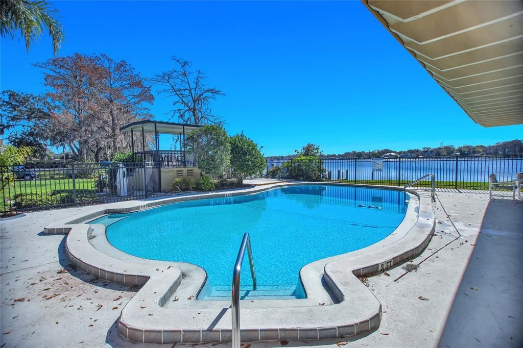 Lakeside Manor's stunning lakefront pool oasis.