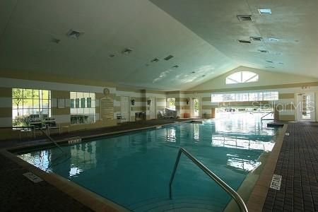 INDOOR POOL WITH WATER FALL