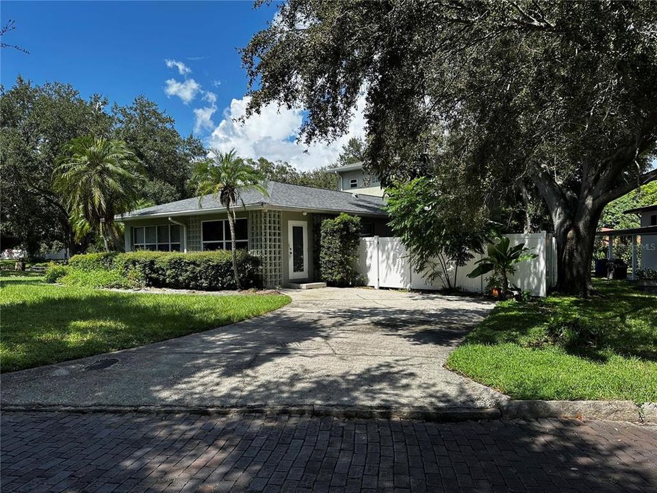 The home includes a front and rear driveway.