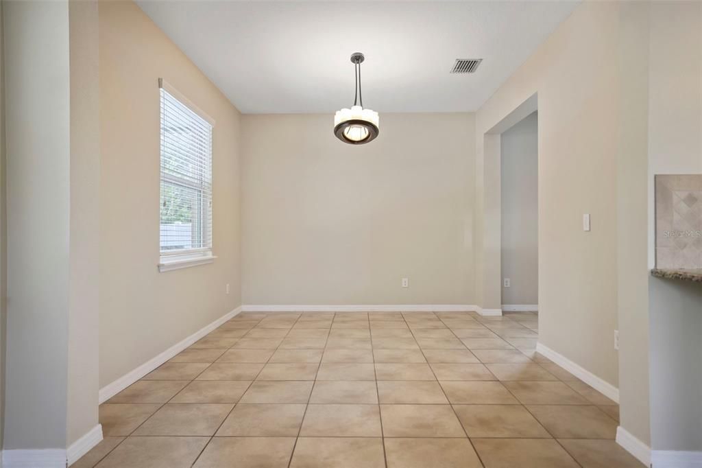 Empty Dining Room with Ceiling Fan