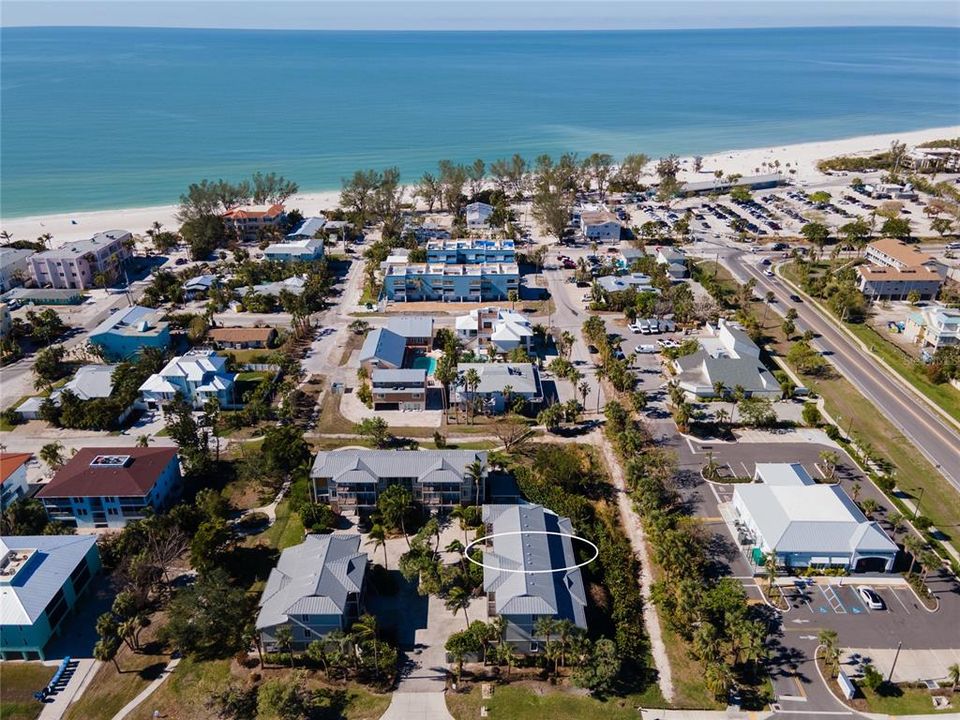 A view to the West shows just how close you are to the beach.  Walk down the path to Skinny's restaurant, West Coast Surf Shop, or the South end of Manatee public beach.