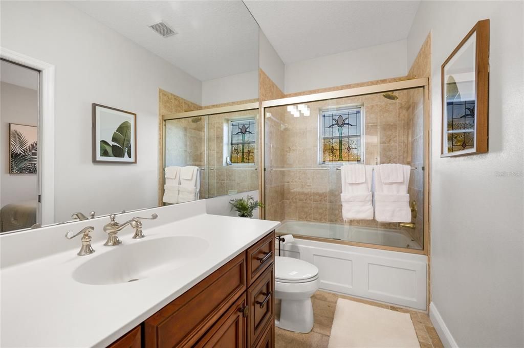 Bathroom with stained glass window