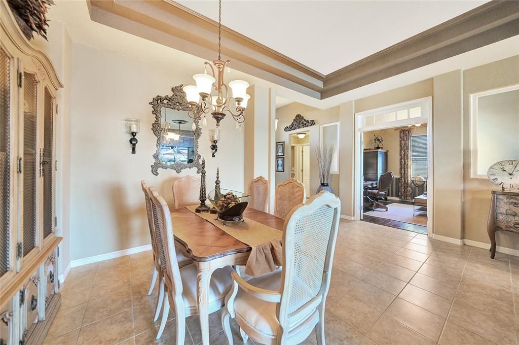 Dining room with beautiful tray ceiling