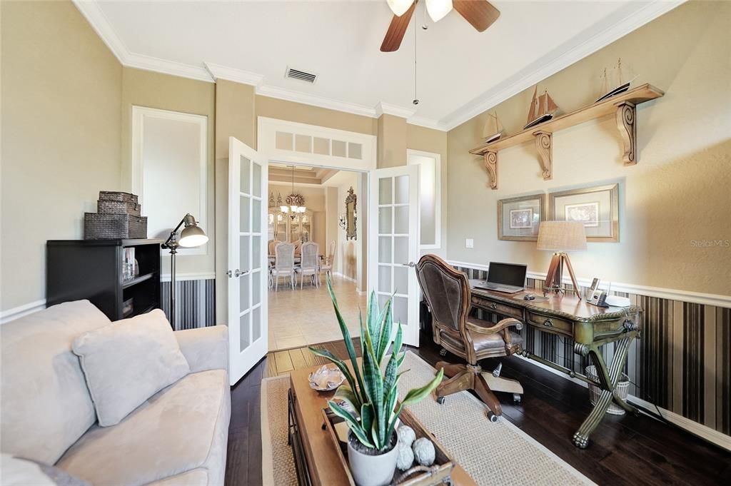 Den/Office or 3rd bedroom with privacy french doors and high ceilings