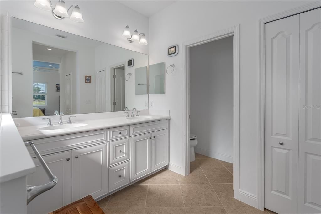 Primary bathroom- dual sinks. Private water closet