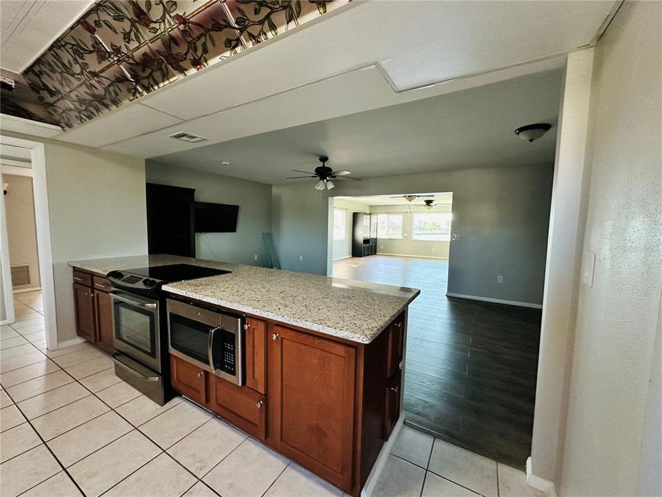 Kitchen overlooking Dining Room and Living Room