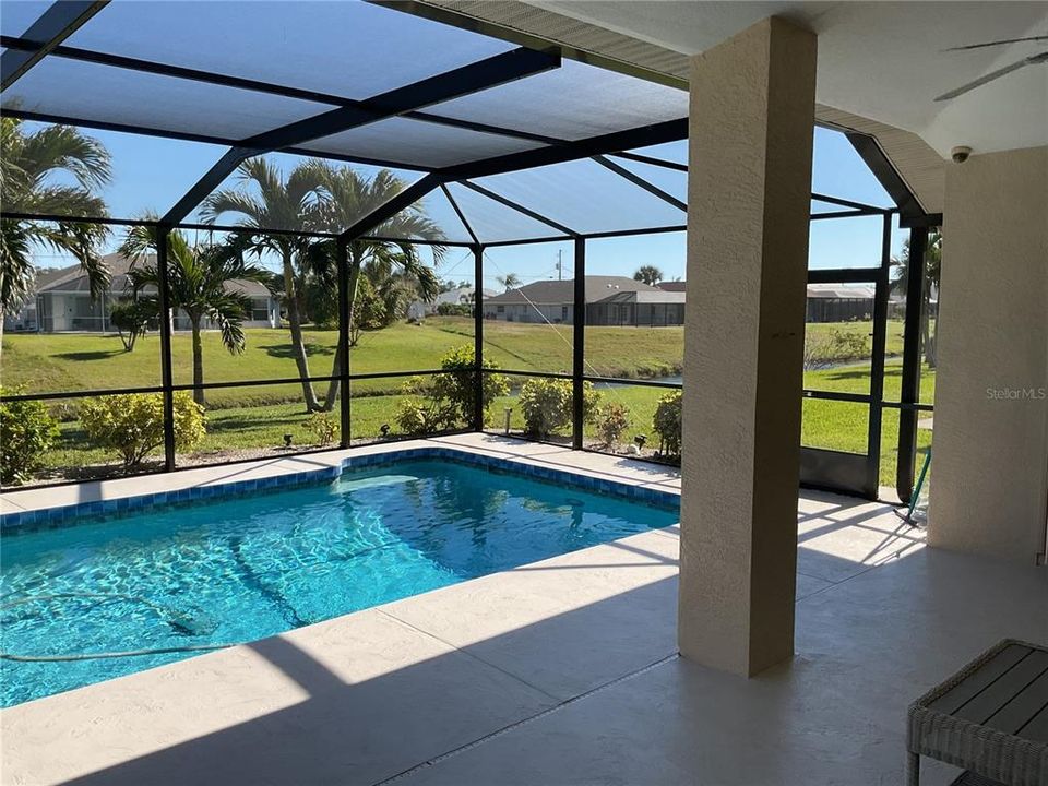 Lanai/pool overlooking canal