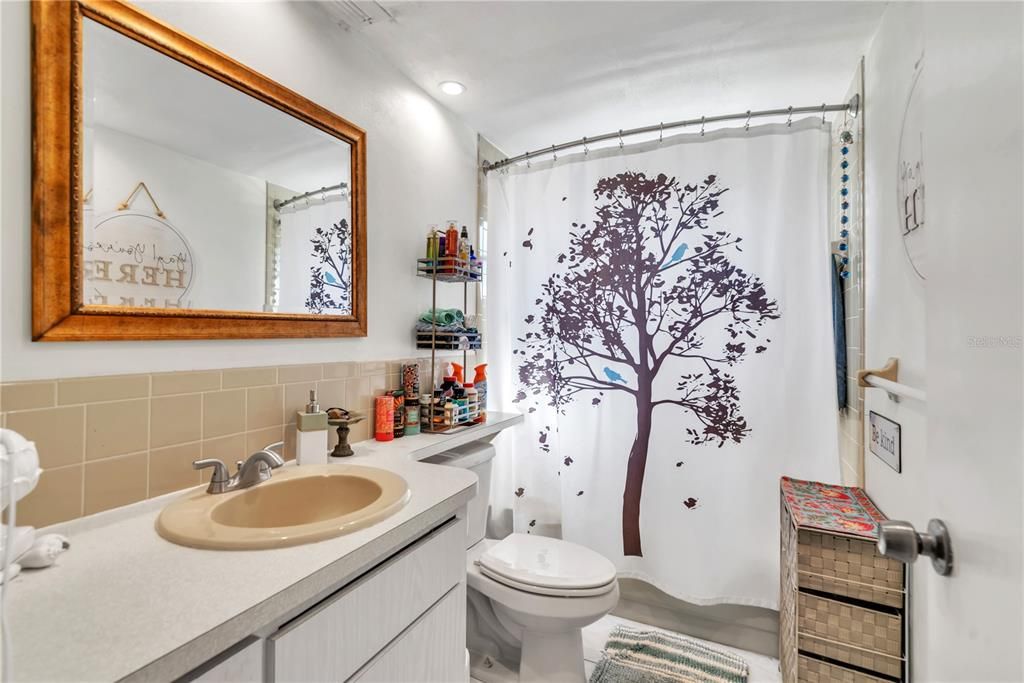 Shared Bathroom With Tub/Shower Combo