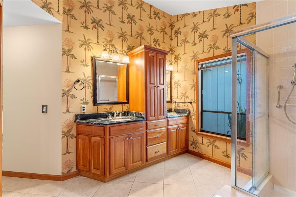 Primary Bathroom Custom Wood and Granite Double Vanity Cabinetry