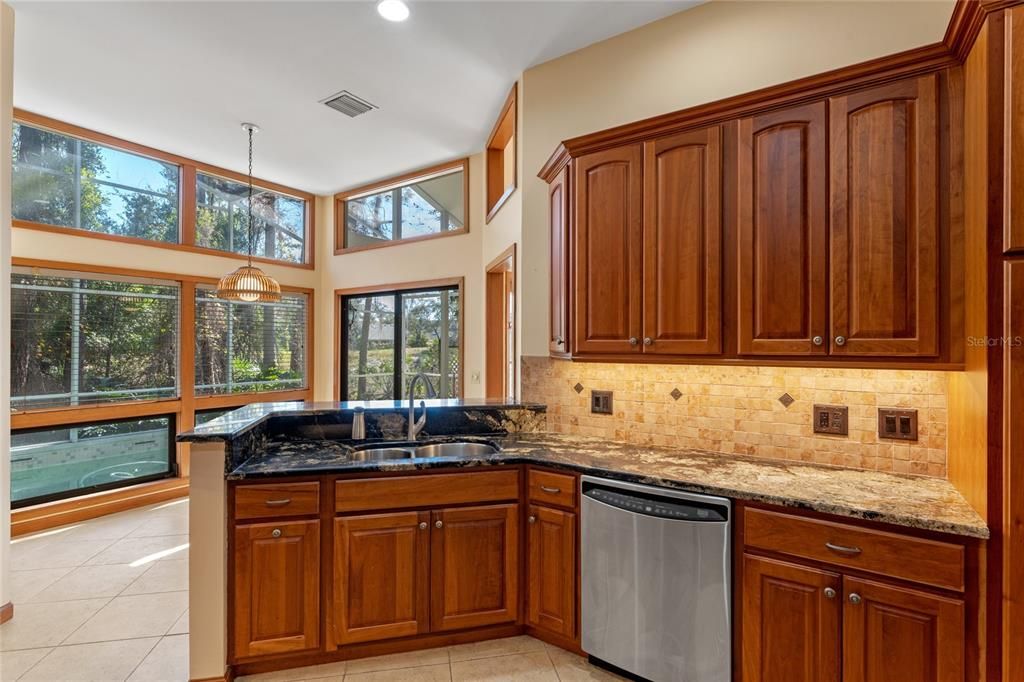 Gourmet Kitchen with Eat in Nook Area overlooking Pool