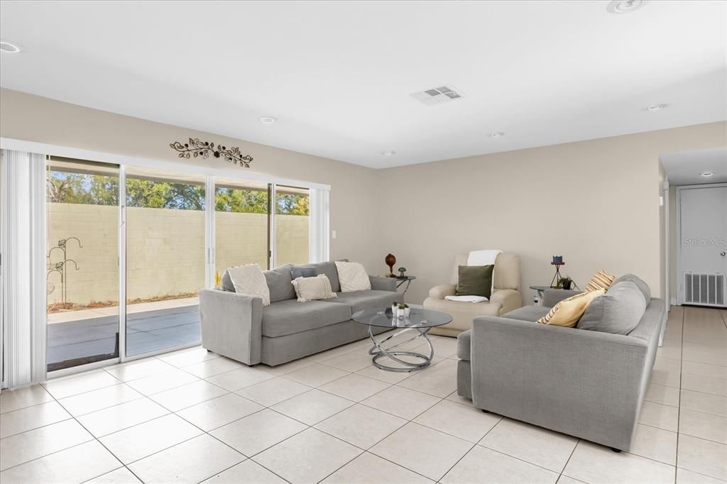 Living Room with view of Private Patio