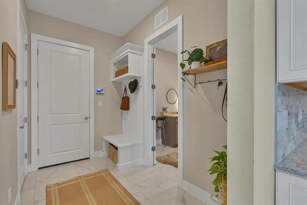 Garage Entry with view to Laundry Room