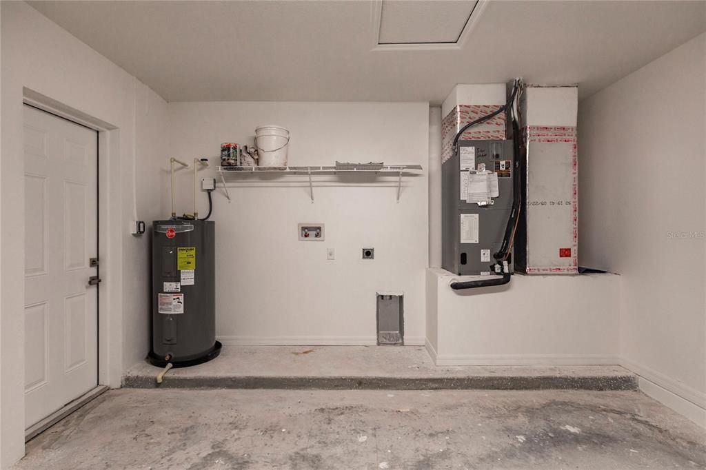 LAUNDRY AREA IN GARAGE