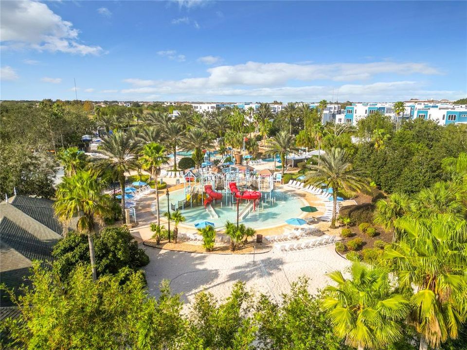 The lazy river pool is surrounded by a spacious deck with comfortable lounge chairs, where guests can rest in the sun or under the shade of umbrellas.  In addition, there is a great place for the little ones to have fun climbing or going down slides.