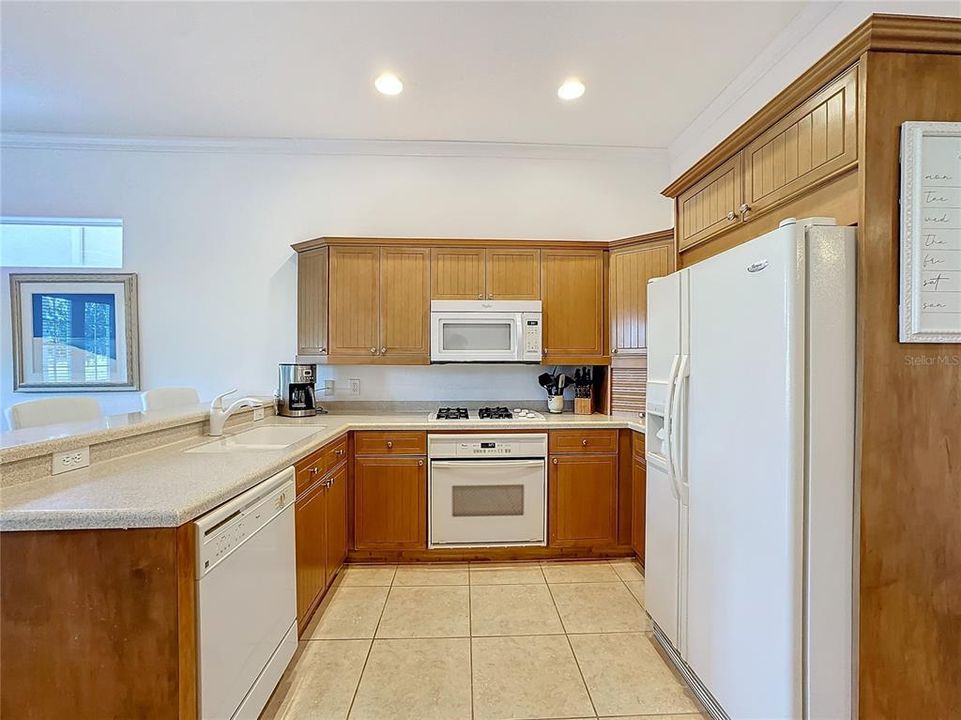 The kitchen provides the right amount of everything - counter space, storage, and more.